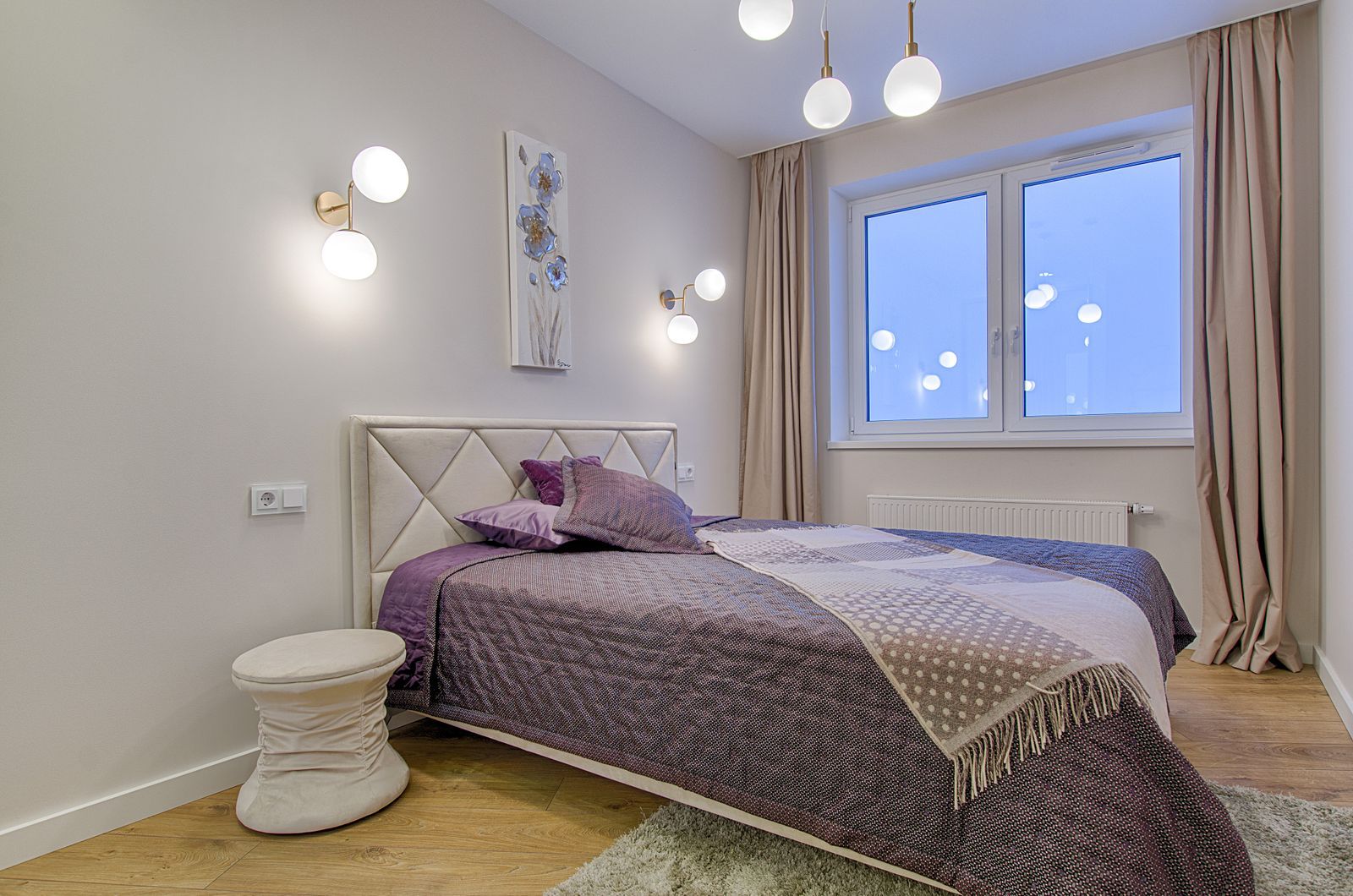 Bright bedroom made up after a residential cleaning visit